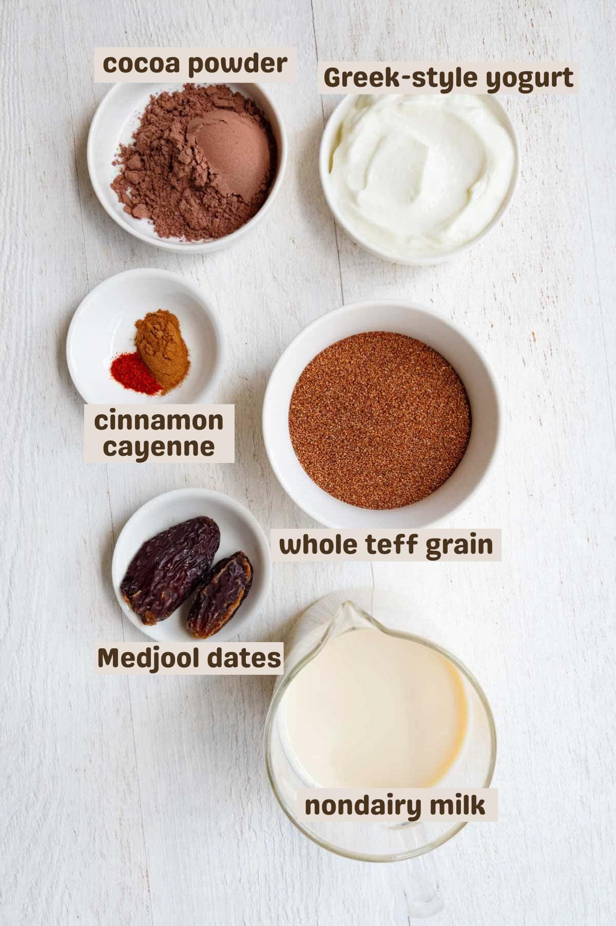 Cocoa powder, Greek-style yogurt, cinnamon, cayenne, whole teff, Medjool dates, and nondairy milk.