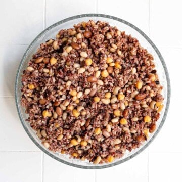 Cooked rice and beans in a large glass bowl.