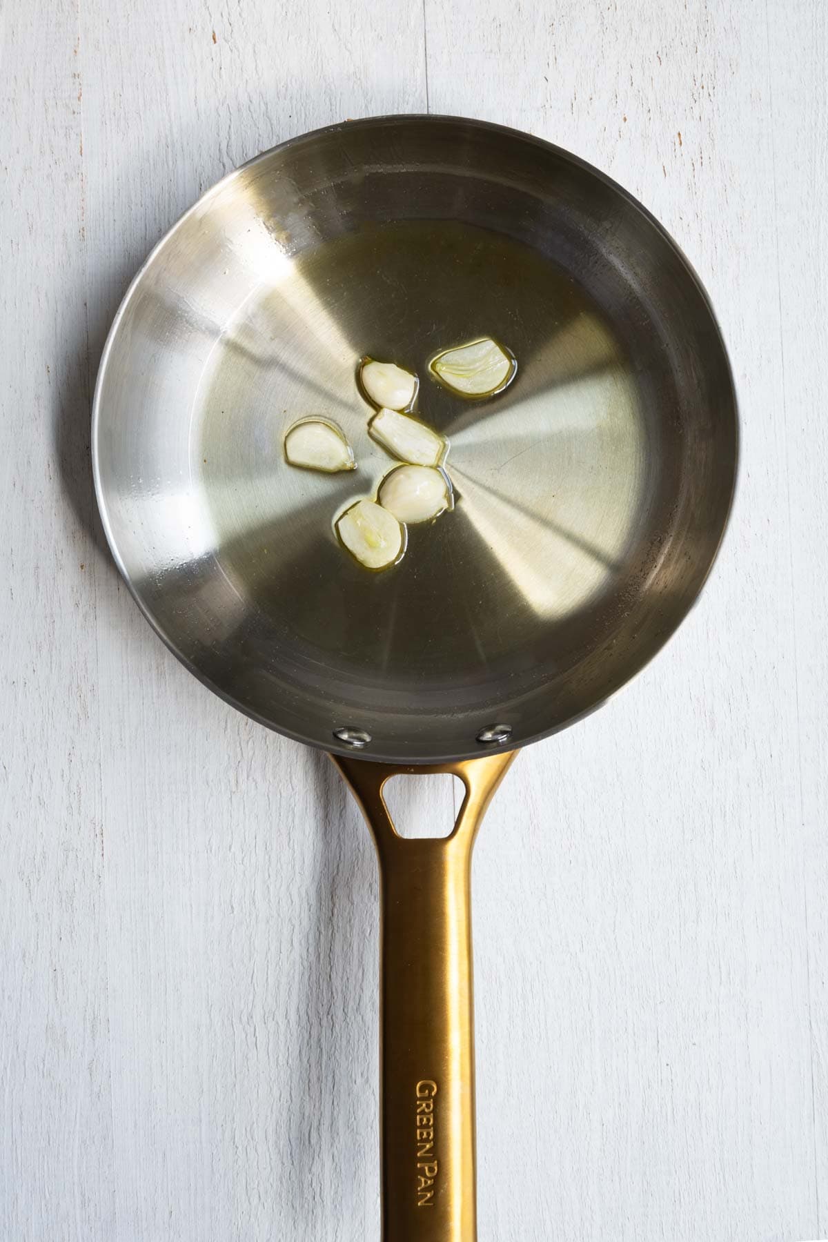 Sautéd garlic in a skillet.