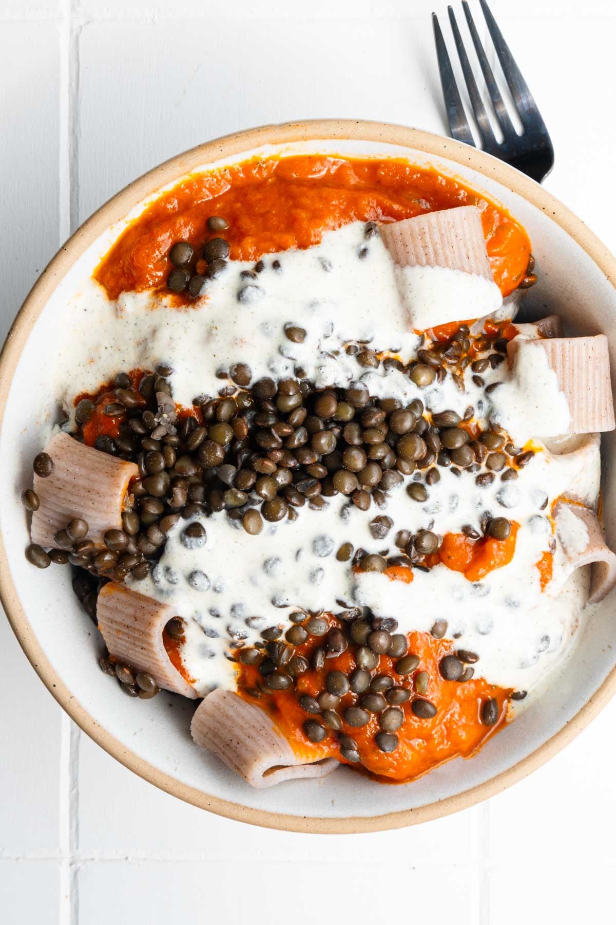 Creamy Tomato-Okra Lentil Pasta in a bowl.