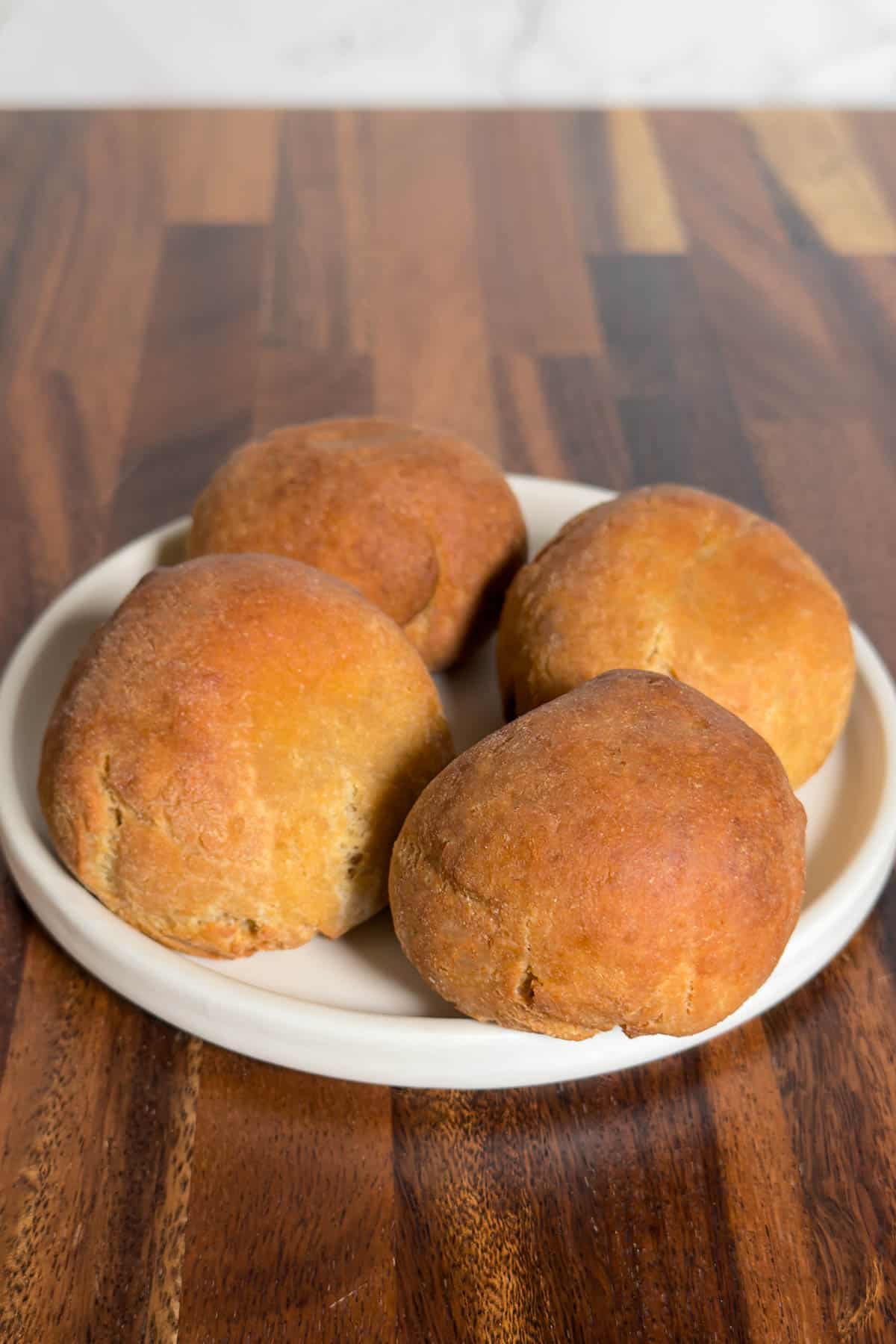 High-protein bread rolls on a plate.