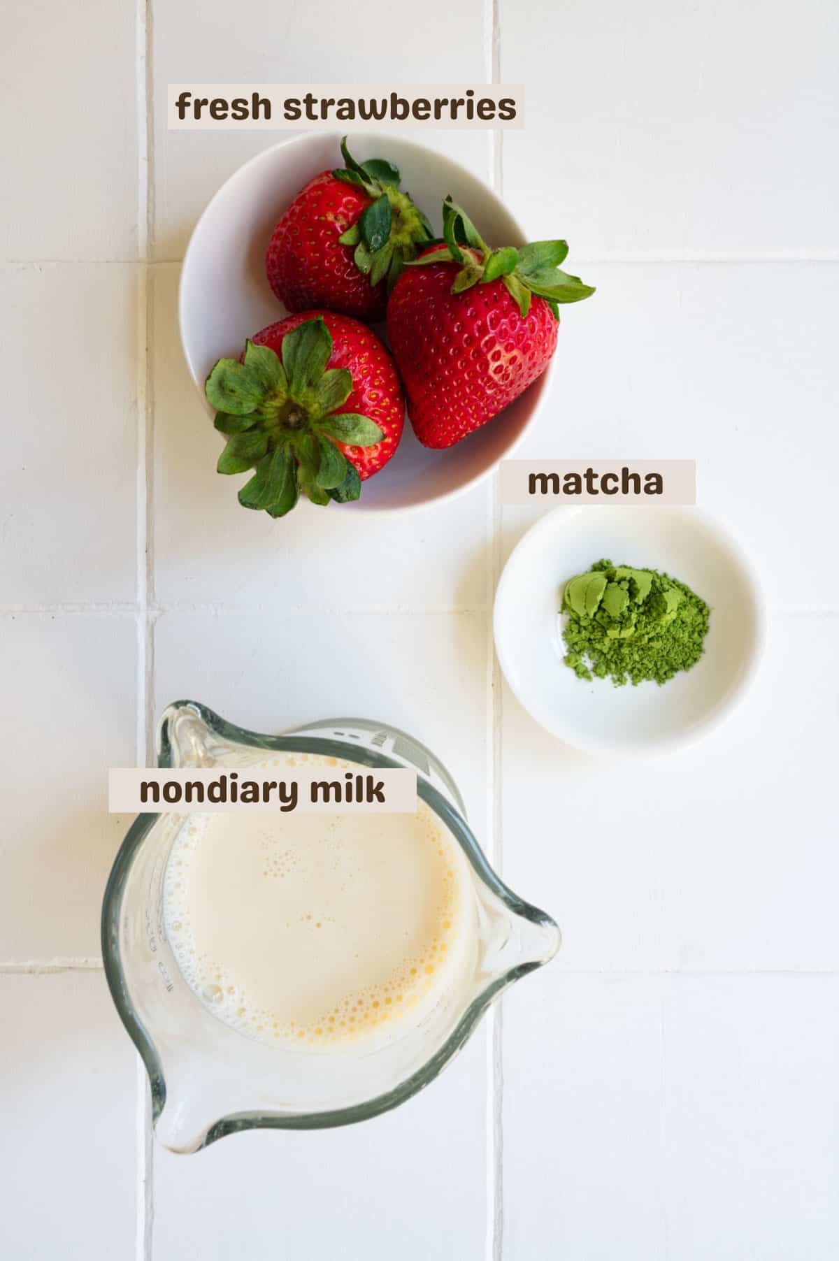 Fresh strawberries, matcha, and nondairy milk.