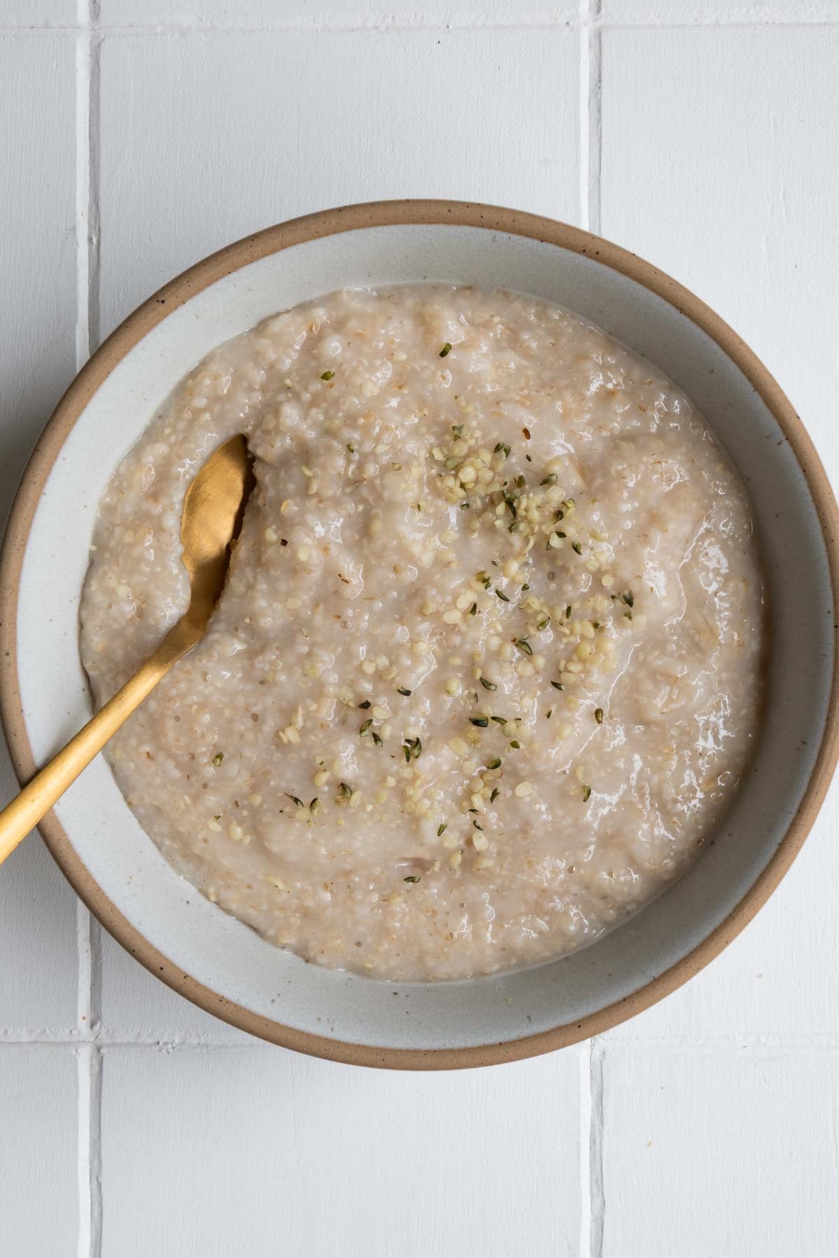 Cooked oatmeal in a bowl.
