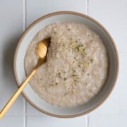 Oat Bran Oats in a bowl with a spoon.