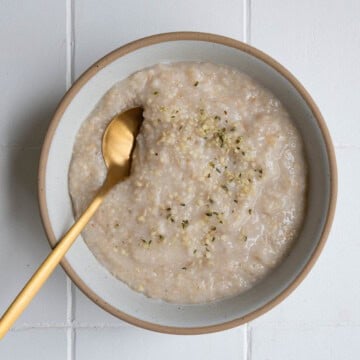 Oat Bran Oats in a bowl with a spoon.