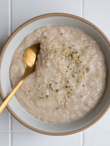 Oat Bran Oats in a bowl with a spoon.