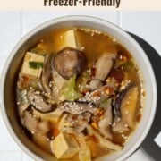 High-fiber high-protein mushroom tofu soup in a white bowl.