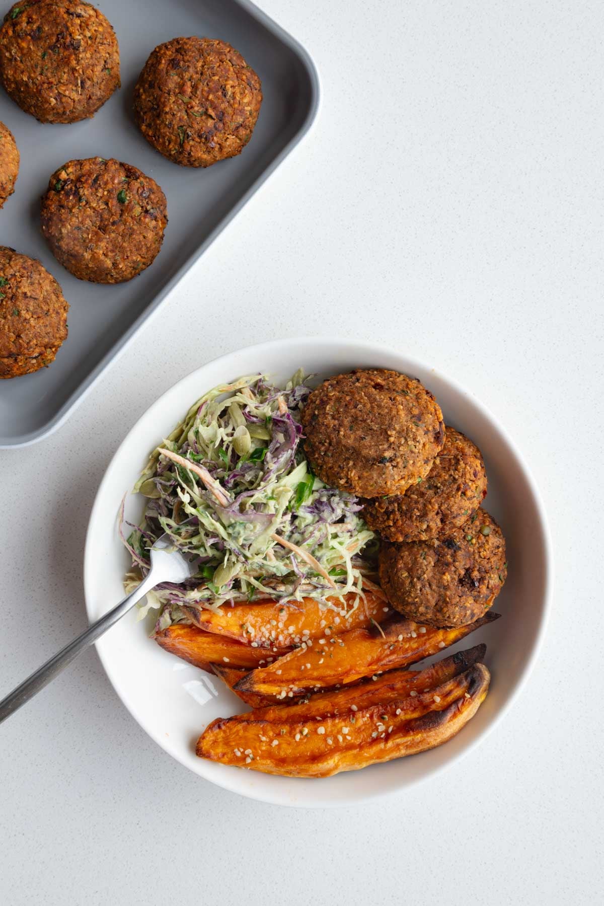 Black bean edamame burgers, sweet potato, and slaw.