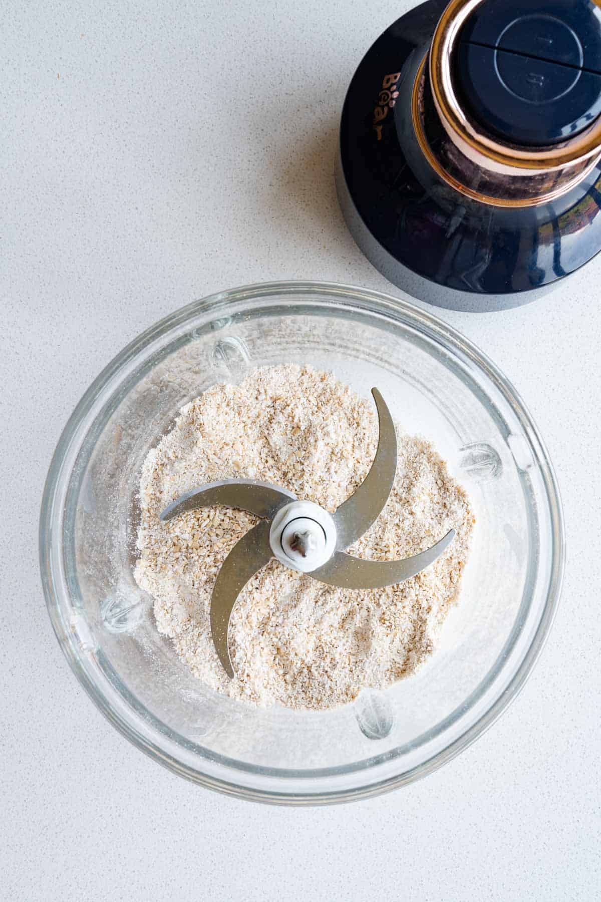 Ground oats in a food processor.