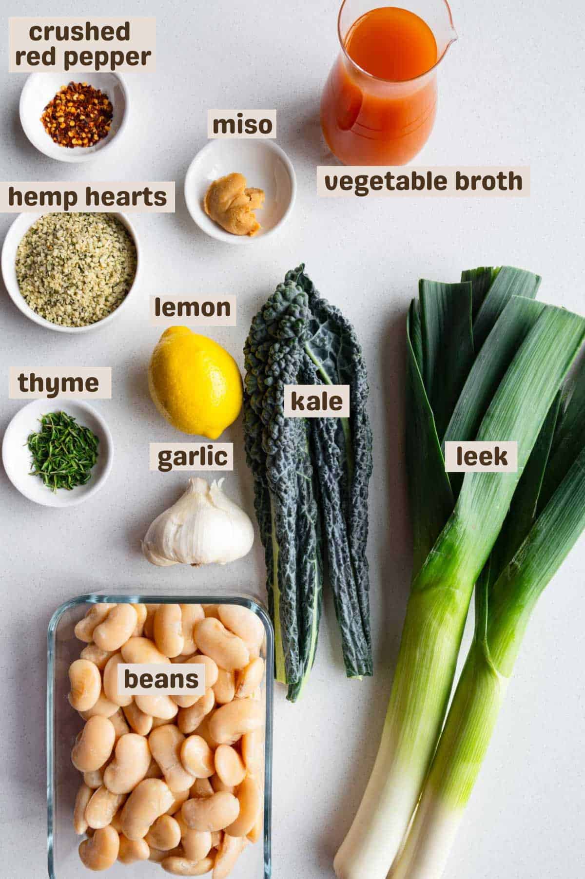Gigante beans, leeks, kale, vegetable broth, lemon, garlic, thyme, hemp hearts, and miso.