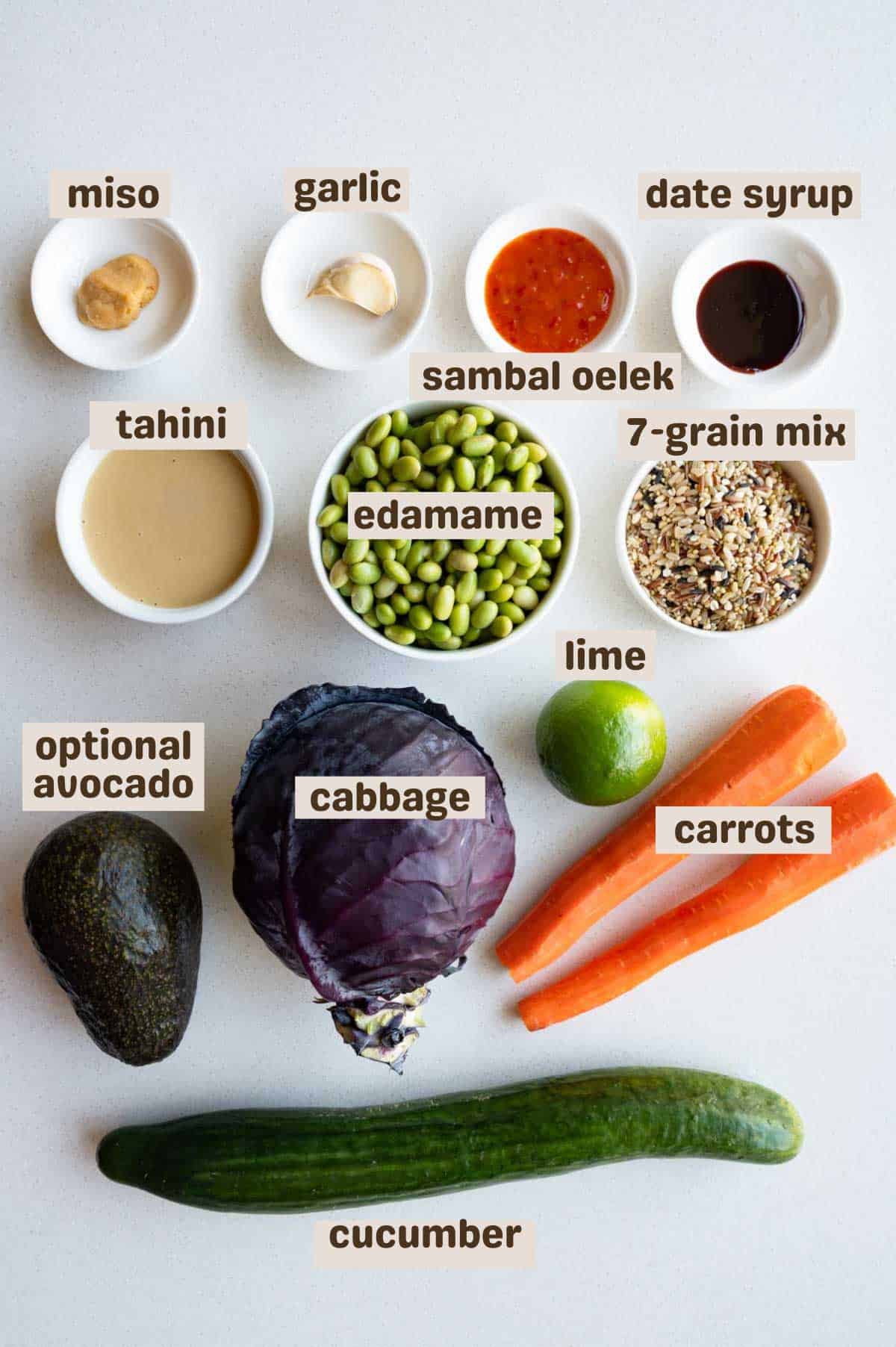Cabbage, carrot, cucumber, edamame, 7-grain blend, miso, garlic, sambal oelek, date syrup, tahini, and avocado.