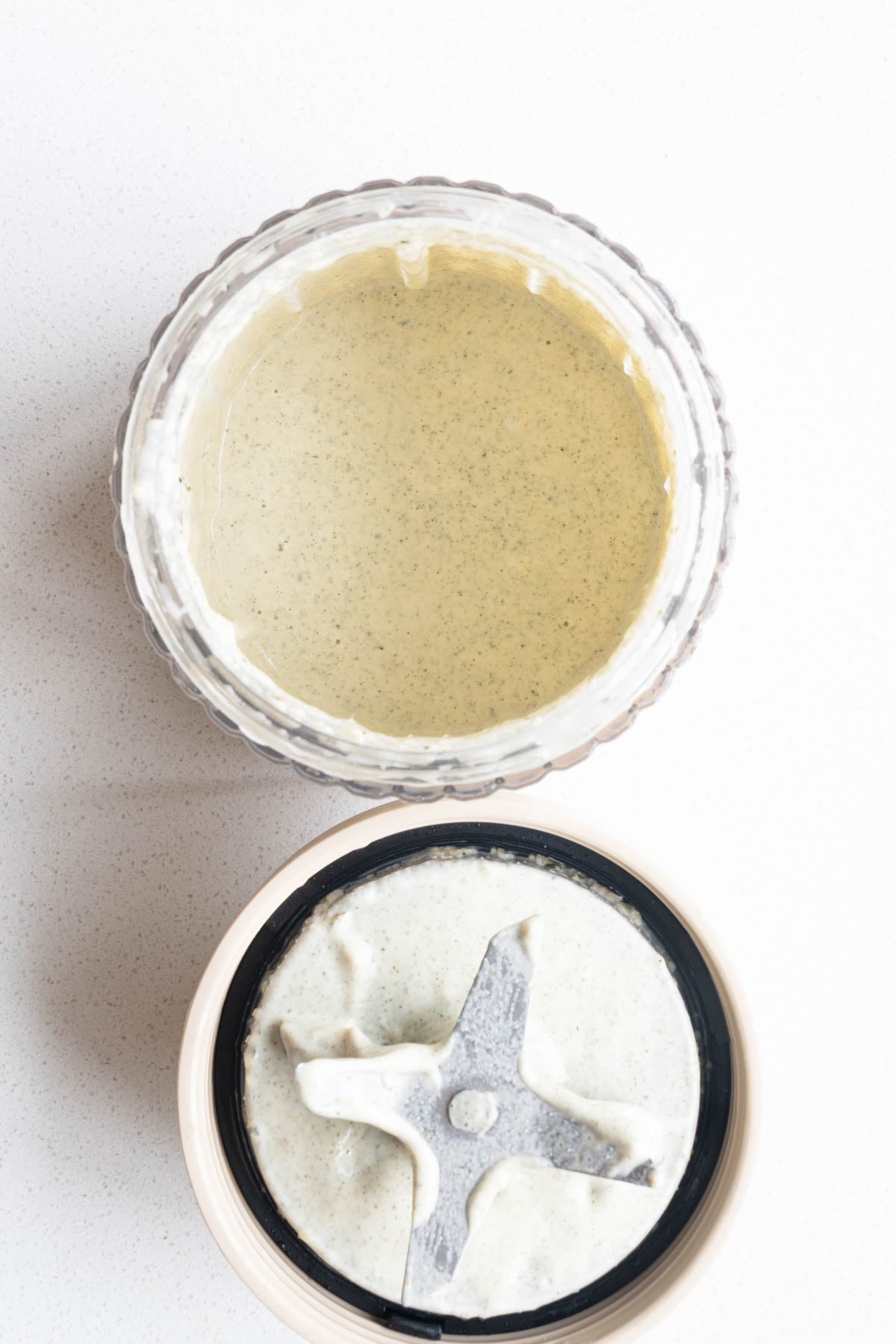 Nondairy cream substitute in the canister of a blender.