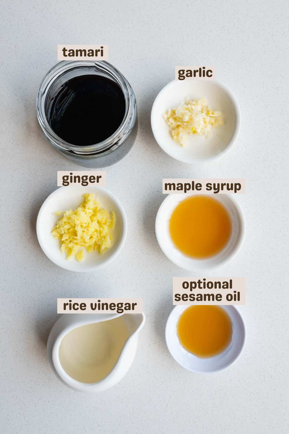 Tamari, ginger, garlic, maple syrup, rice vinegar, and sesame oil.