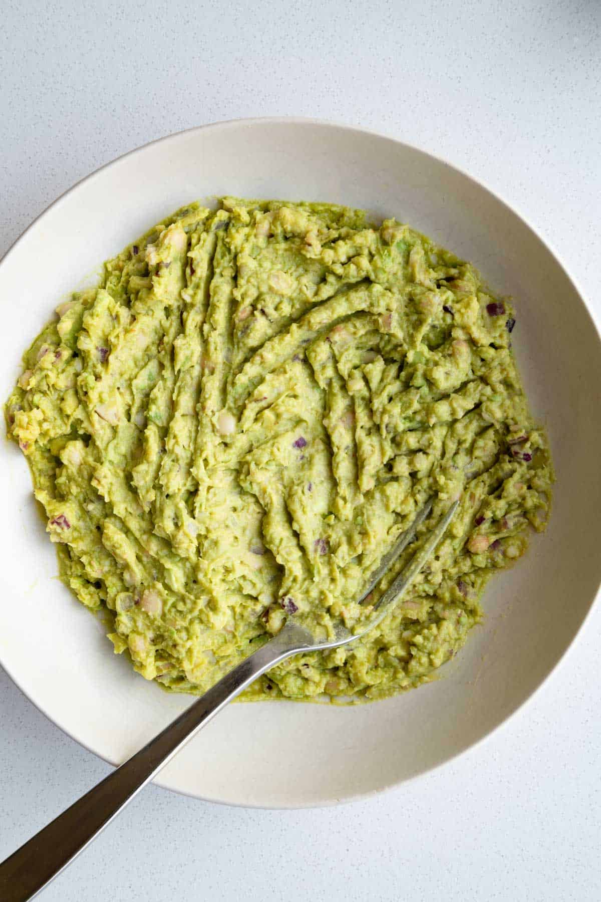 White bean mash in a large bowl.