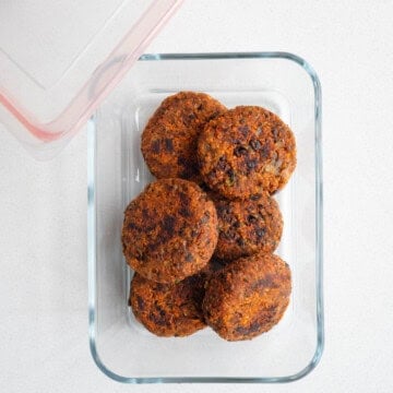 Black soybeans burgers in a glass container.