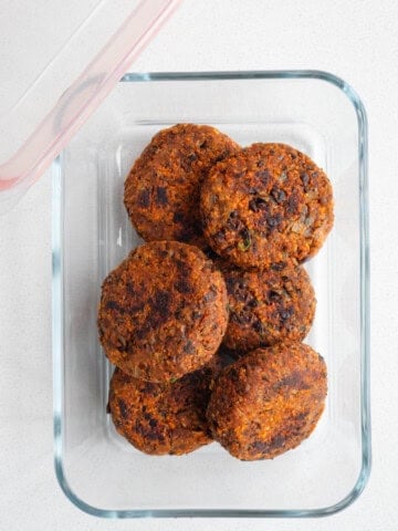 Black soybeans burgers in a glass container.