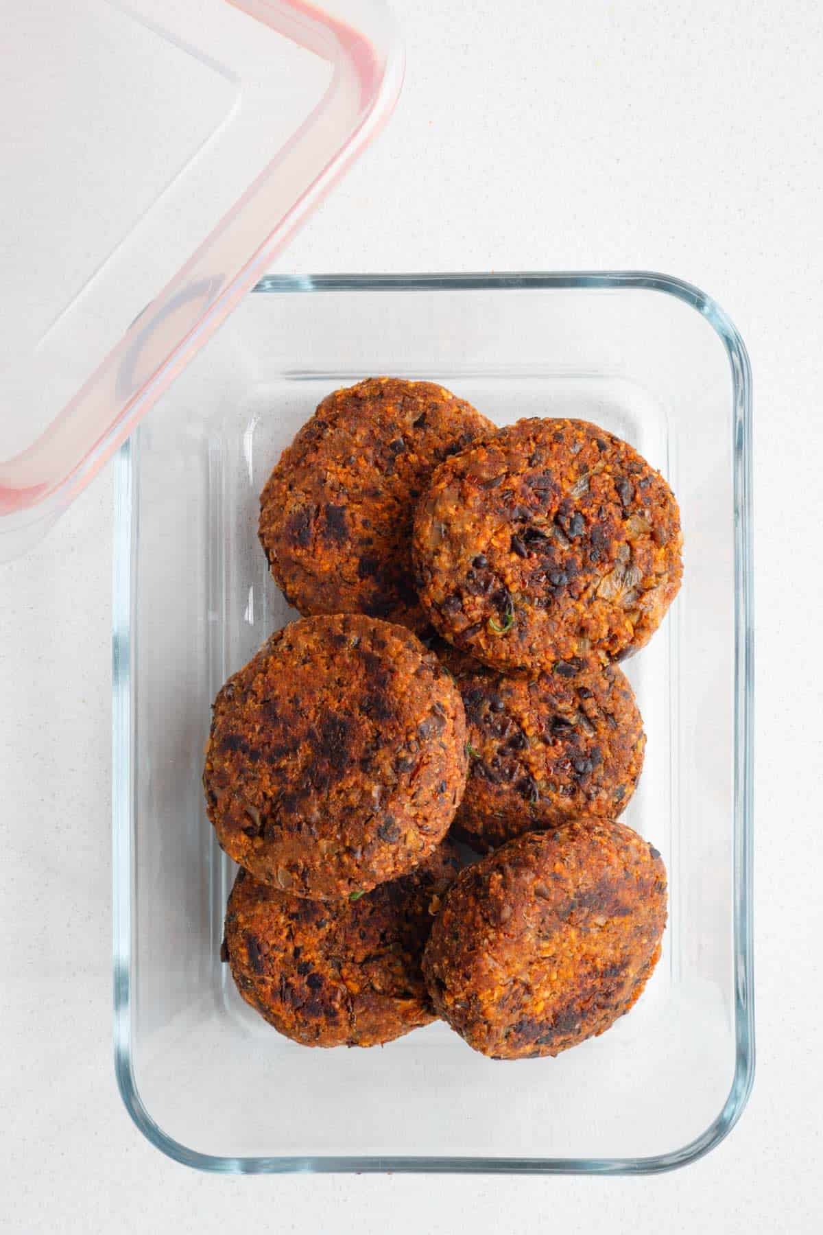 Black soybeans burgers in a glass container.