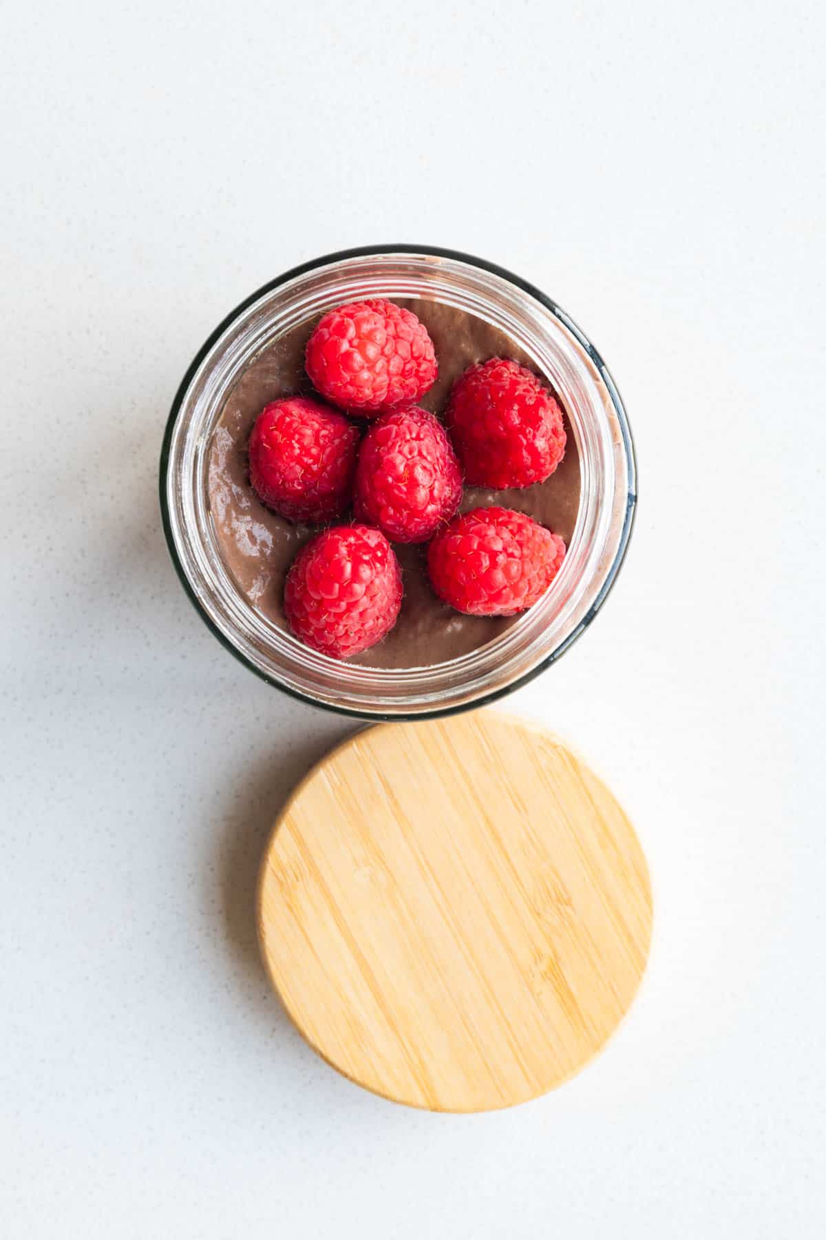 Cholesterol-lowering chocolate mousse in a glass container.