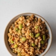 Bowl with creamy bean and barley salad.