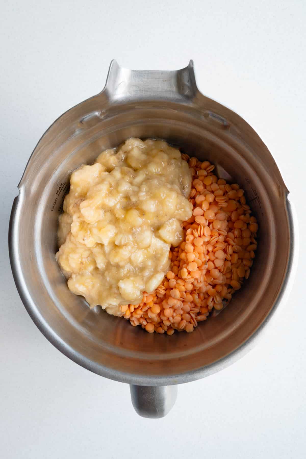 Mashed bananas and soaked red lentils in a blender.