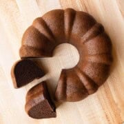 High-protein chocolate cake sliced on a cutting board. Vegan, flourless, and healthy.