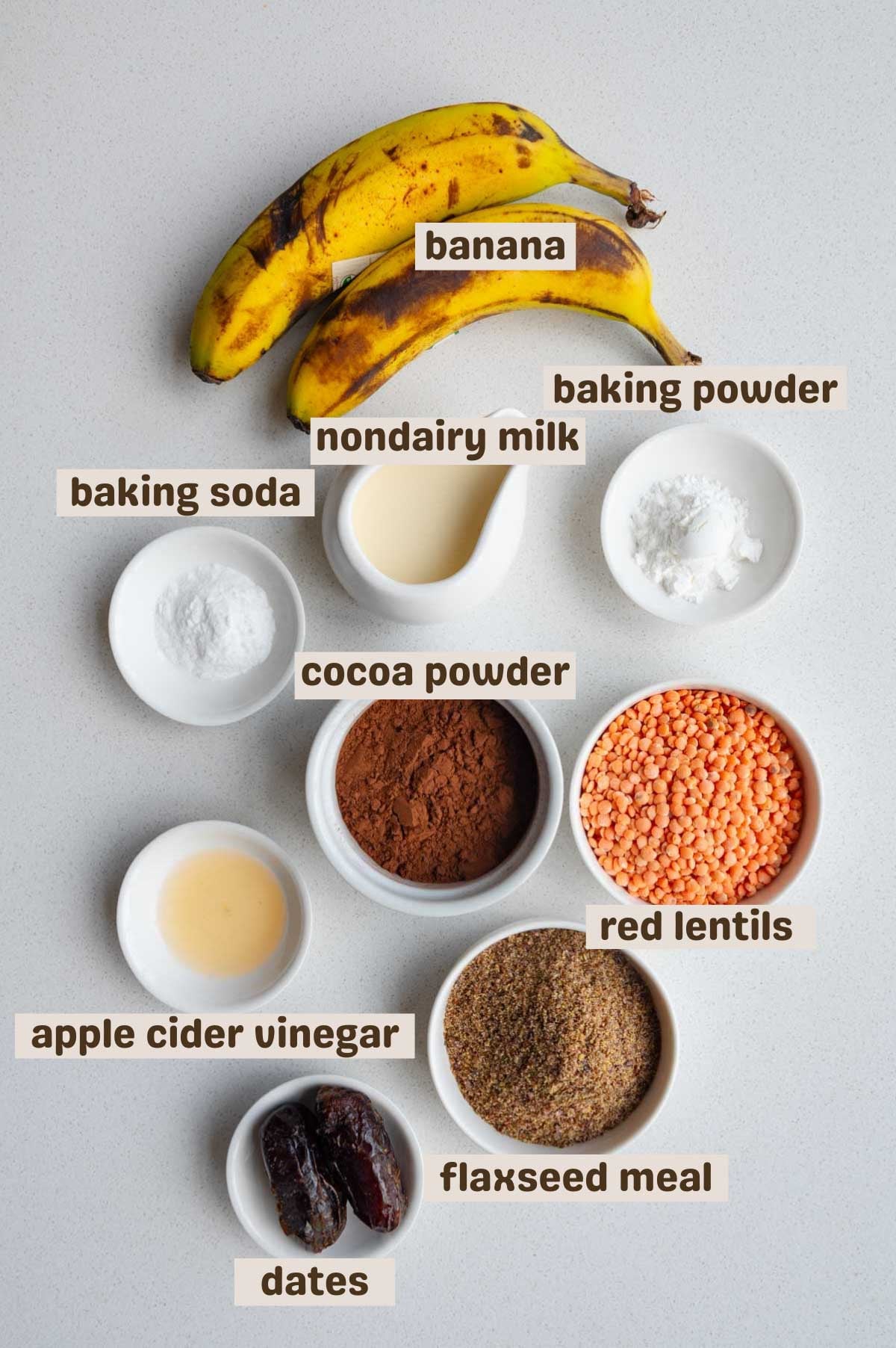 bananas, baking powder, baking soda, nondairy milk, cocoa powder, red lentils, dates, apple cider vinegar, and flaxseed meal.
