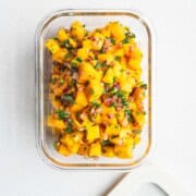 Fresh mango salsa in a glass dish.