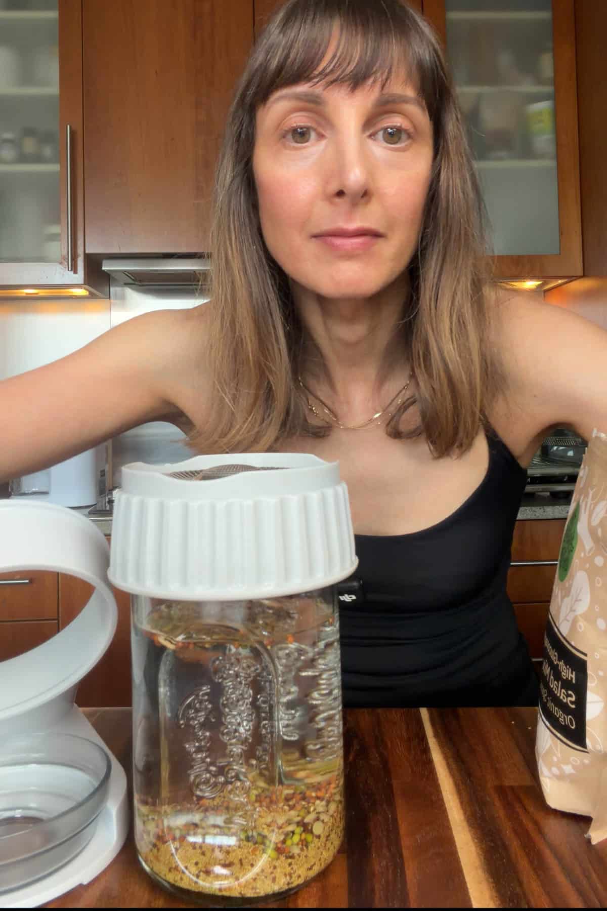 High-glucoraphanin sprouts salad mix seeds in a sprouting jar.