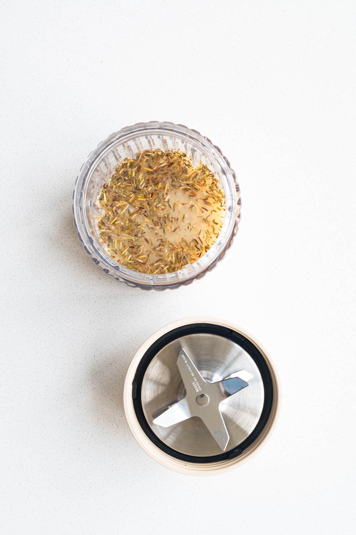 Pickle juice, tahini, lemon juice, garlic, mustard, miso, dried herbs, and onion powder in a blender.