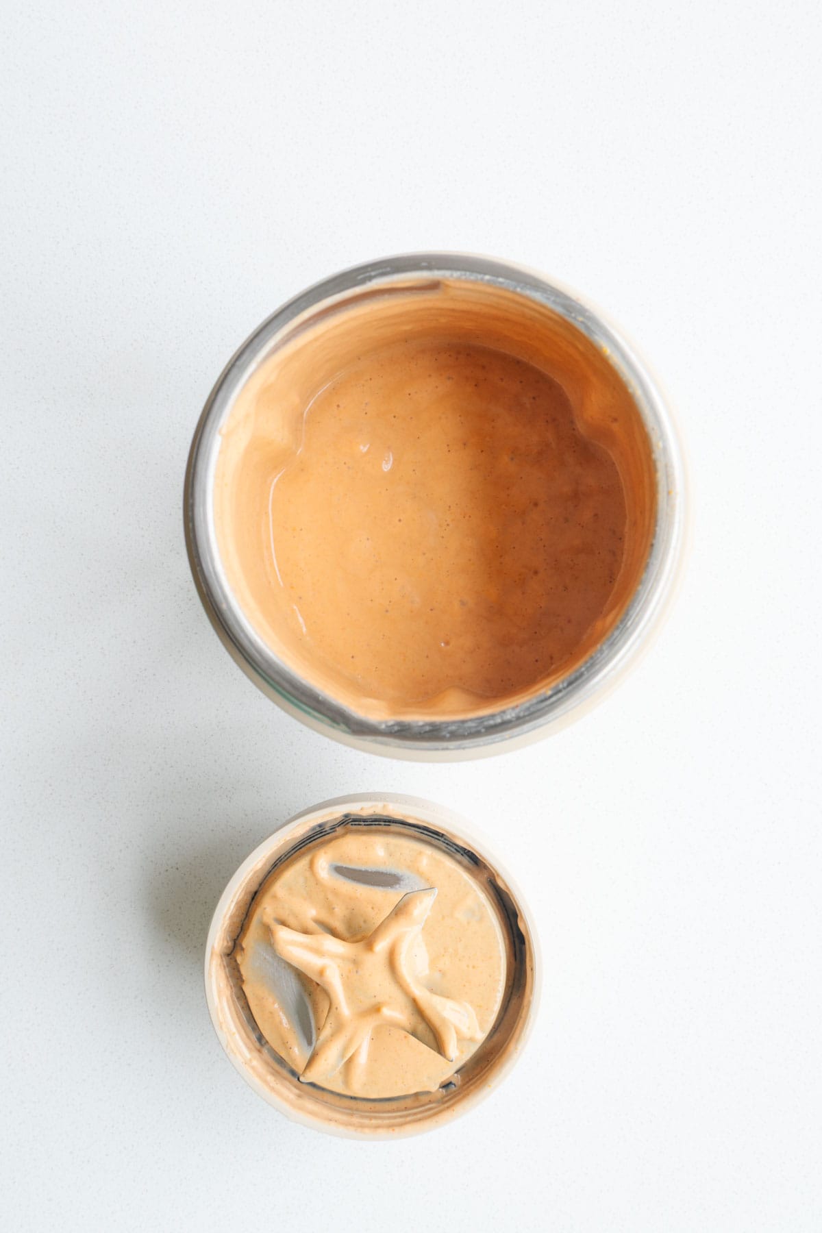 Creamy artichoke dressing in a blender.