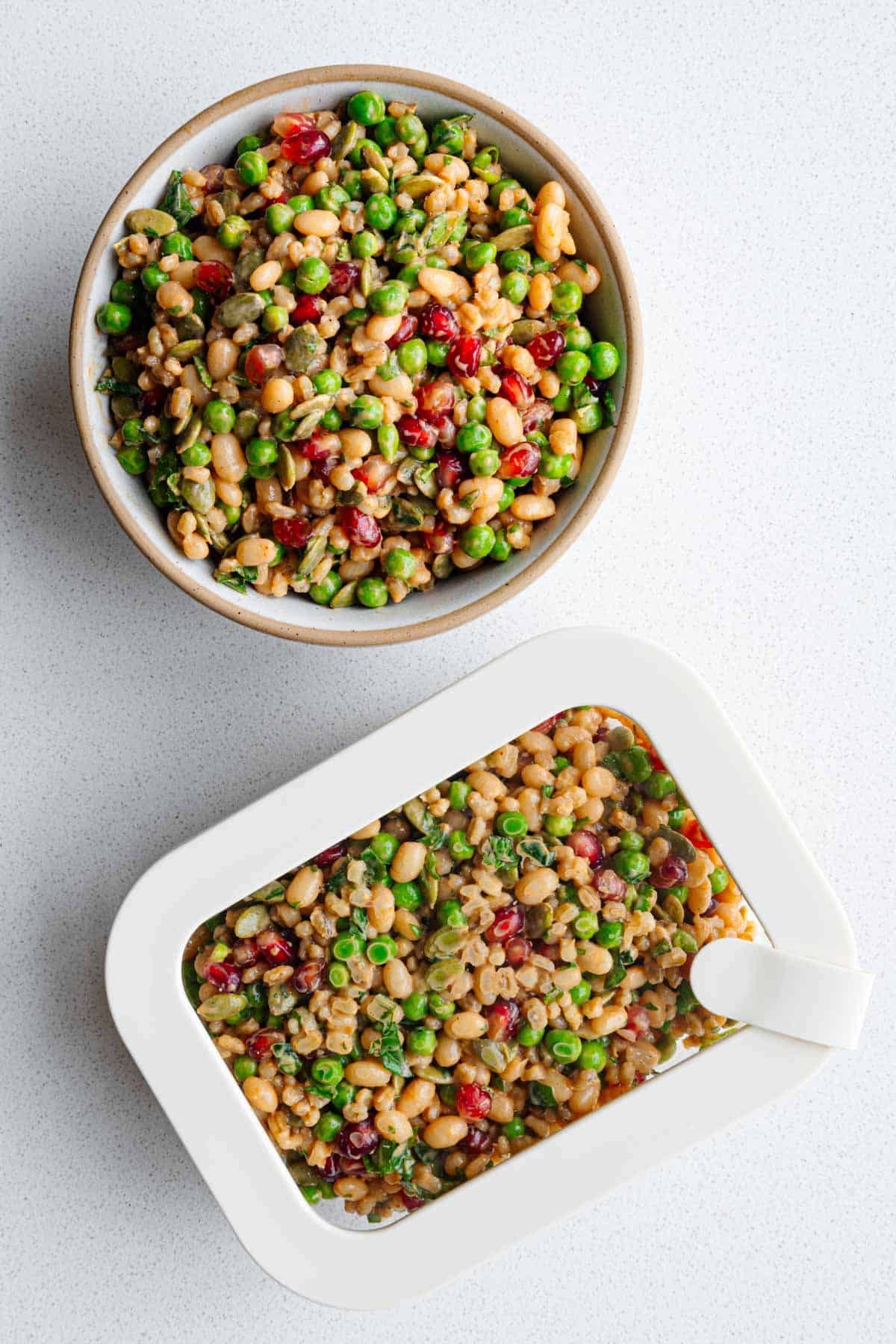 Meal prepped white bean barley salad.