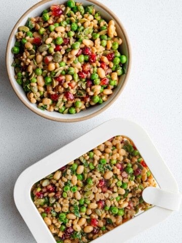 High-protein meal-prep barley salad in a bowl and airtight container.