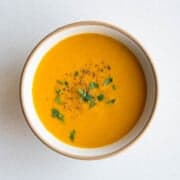 Creamy lentil barley soup in a bowl.