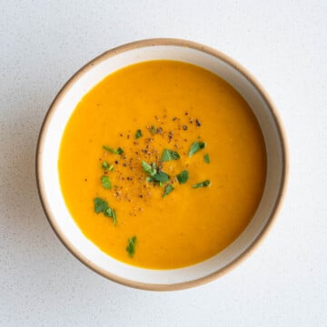 Creamy lentil barley soup in a bowl.