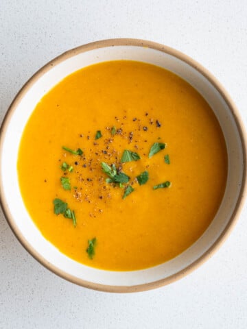 Creamy lentil barley soup in a bowl.