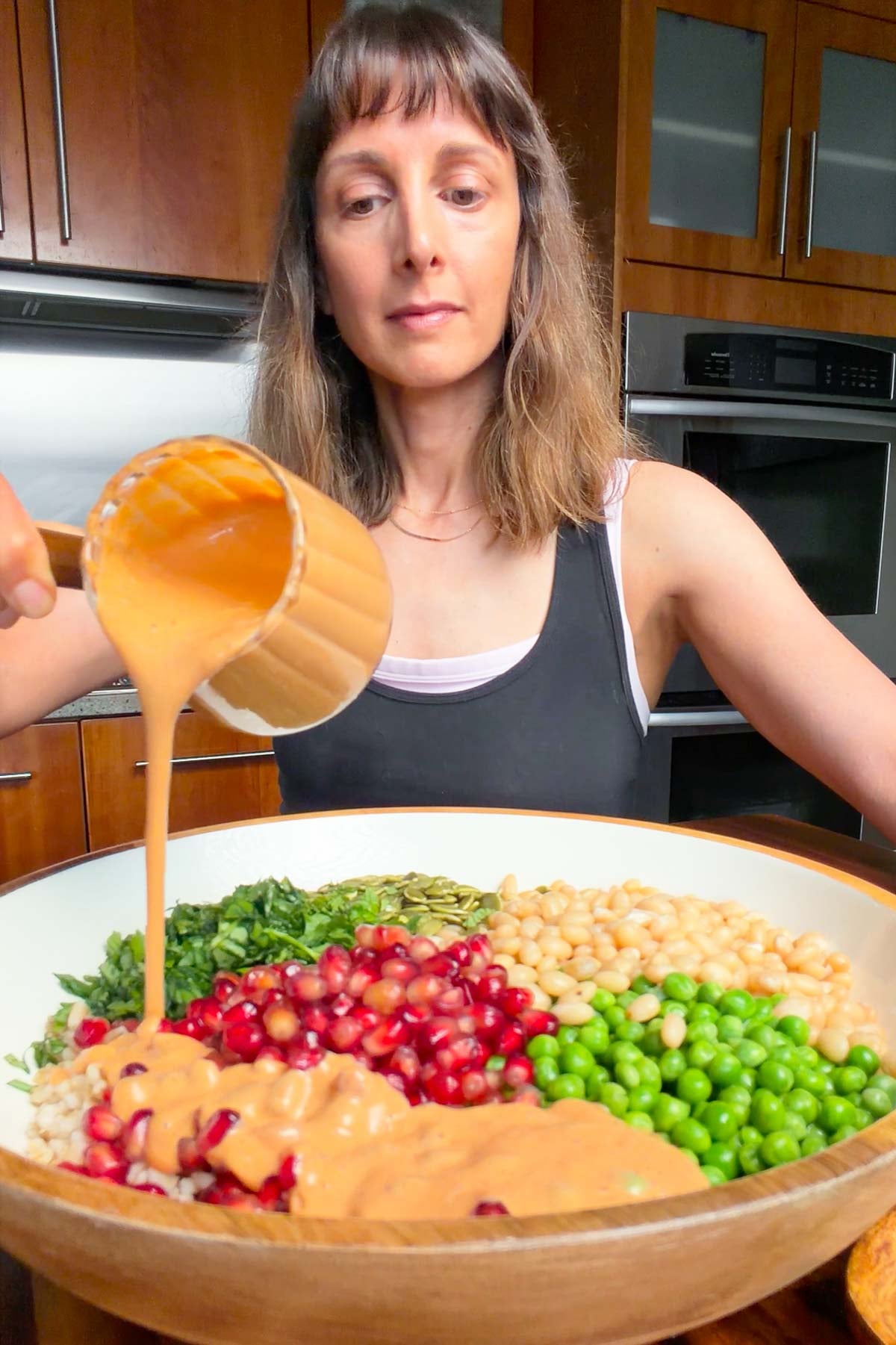 Nisha Melvani making high-protein salad with barley.