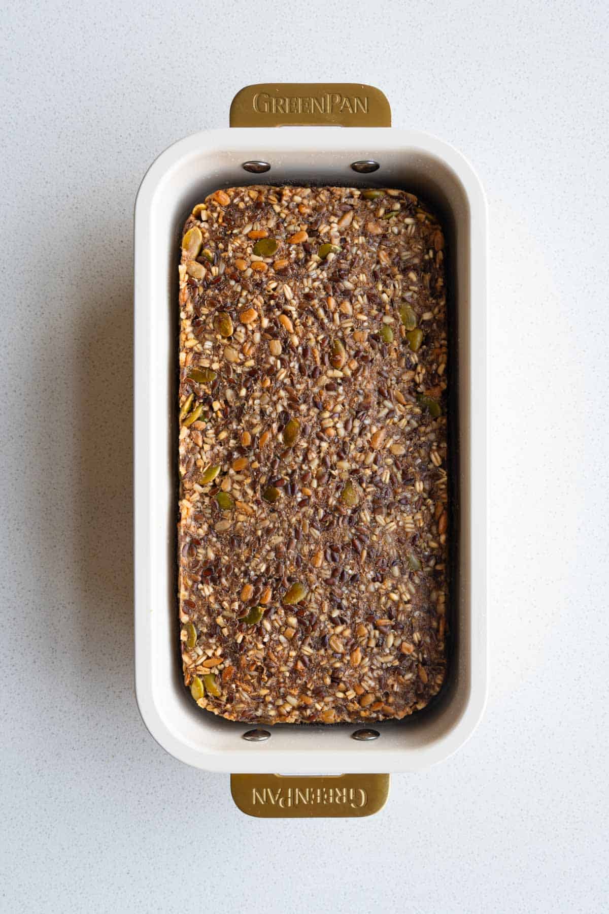 Baked Porridge Bread in a loaf pan.