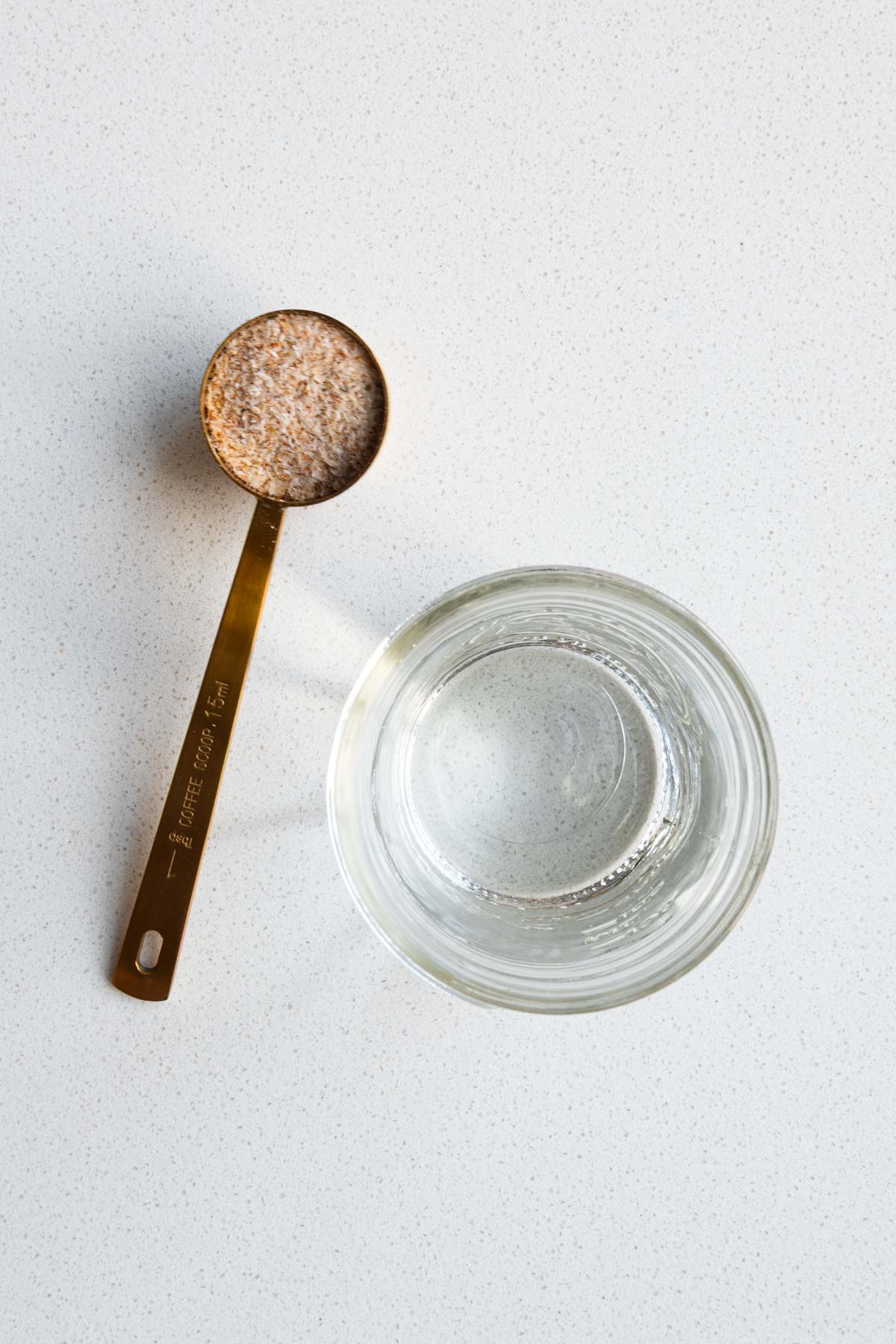 Whole psyllium in a tablespoon with water.