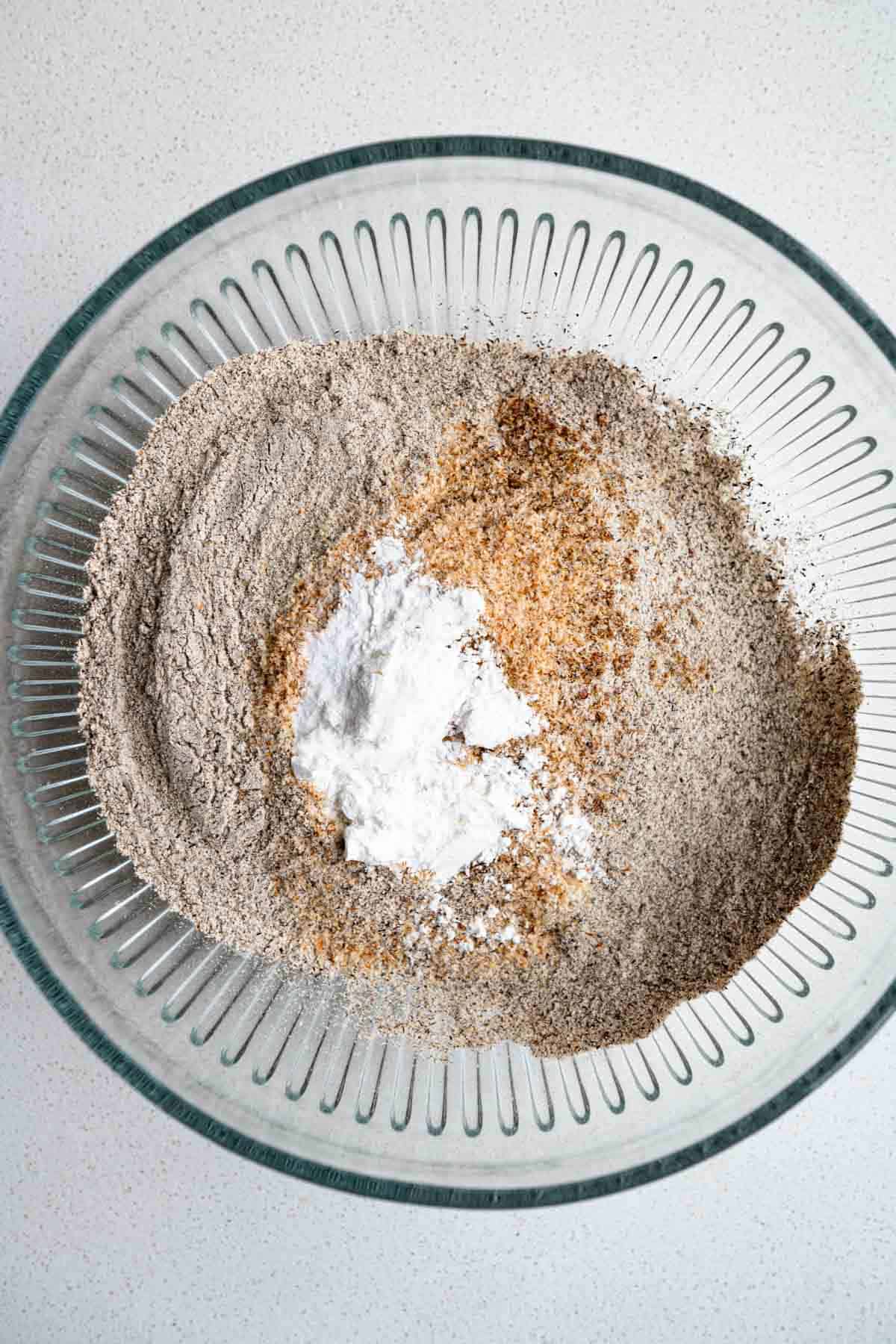 Flaxseed meal, black sesame seeds, buckwheat flour, psyllium husk, baking powder, baking soda, and ground black sesame seeds.