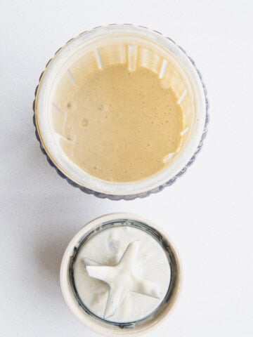 Creamy lime miso dressing in a blender.