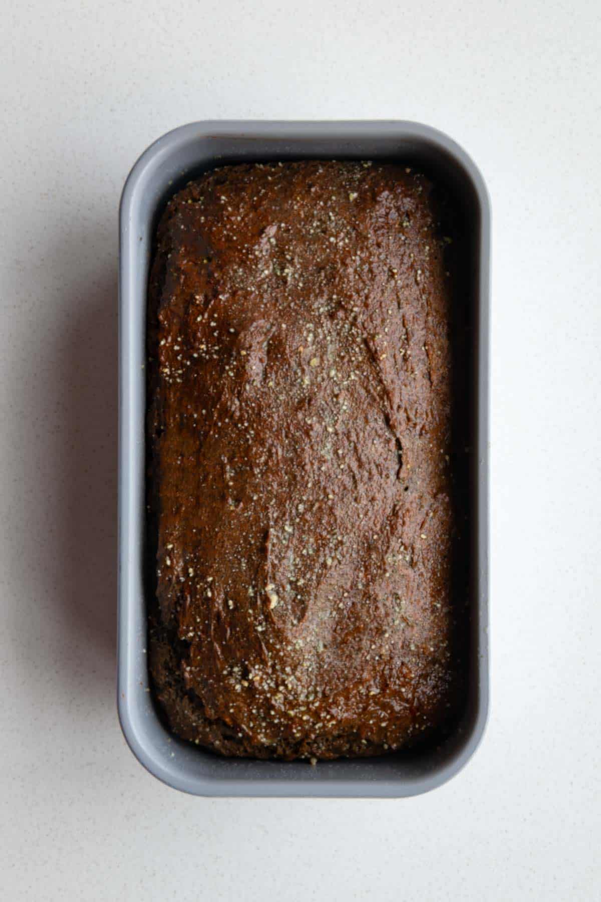 Healthy banana bread recipe in a loaf pan.