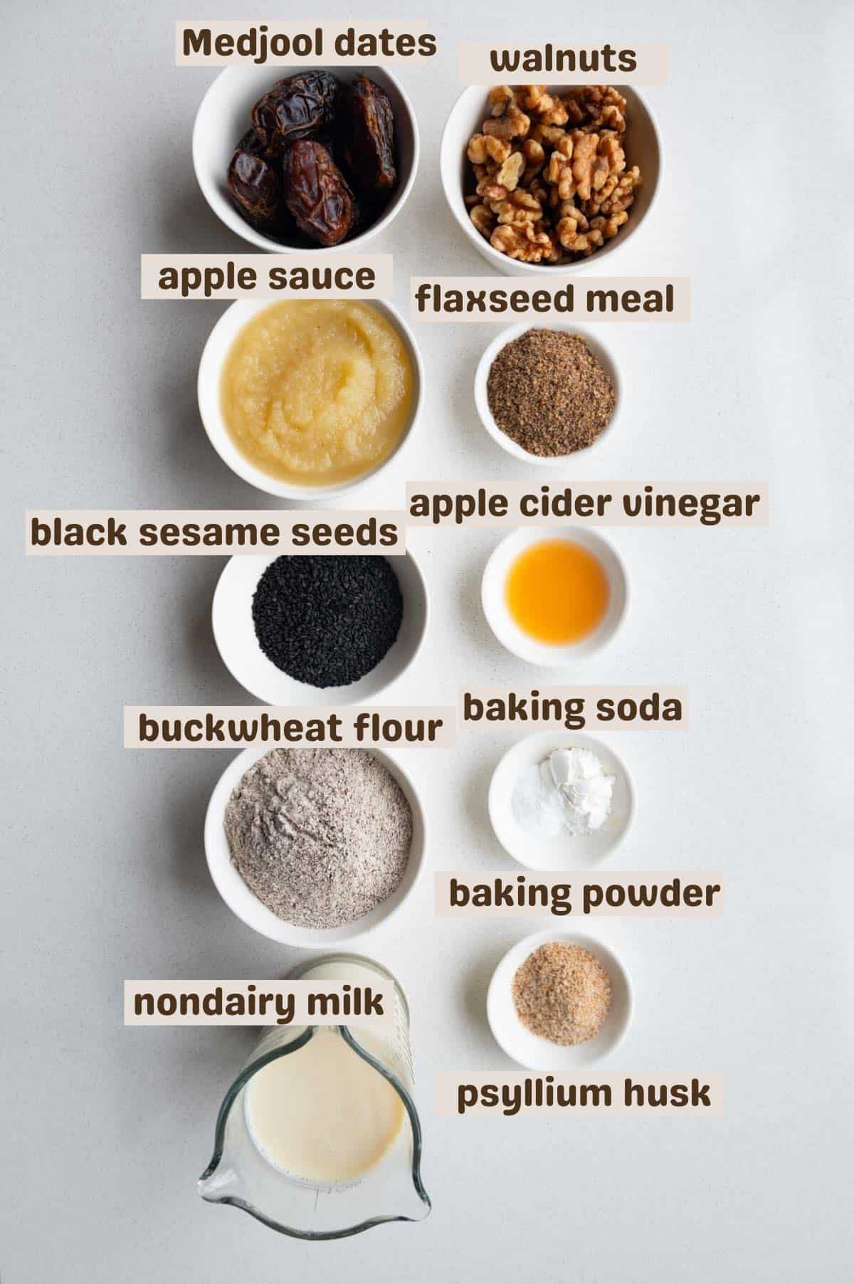 Medjool dates, walnuts, applesauce, flaxseed meal, black sesame seeds, apple cider vinegar, buckwheat flour, psyllium husk, nondairy milk, baking powder, baking soda, and black sesame seeds.
