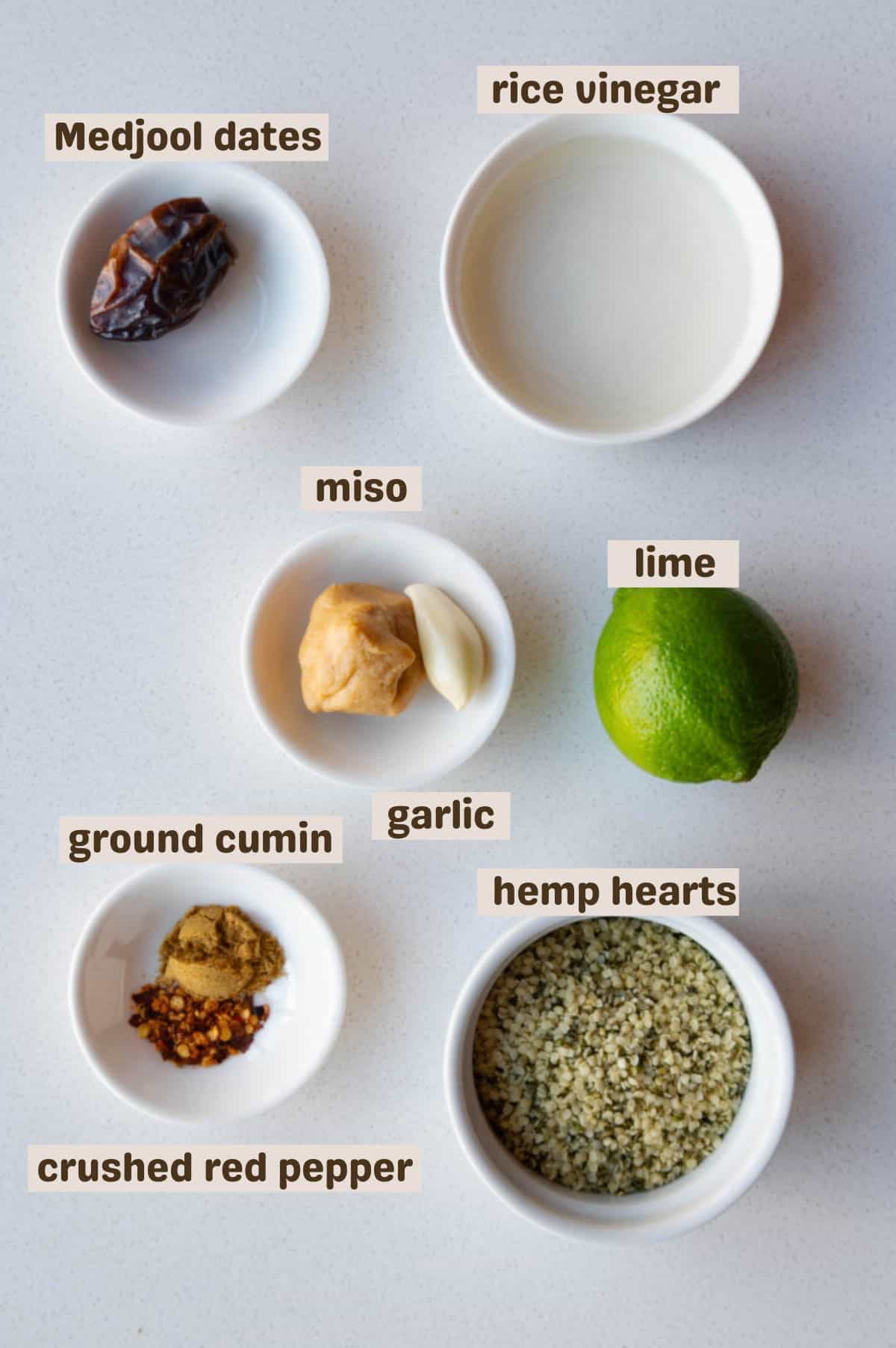 Medjool date, rice vinegar, hemp hearts, crushed red pepper, lime, ground cumin, miso, garlic, and rice vinegar.