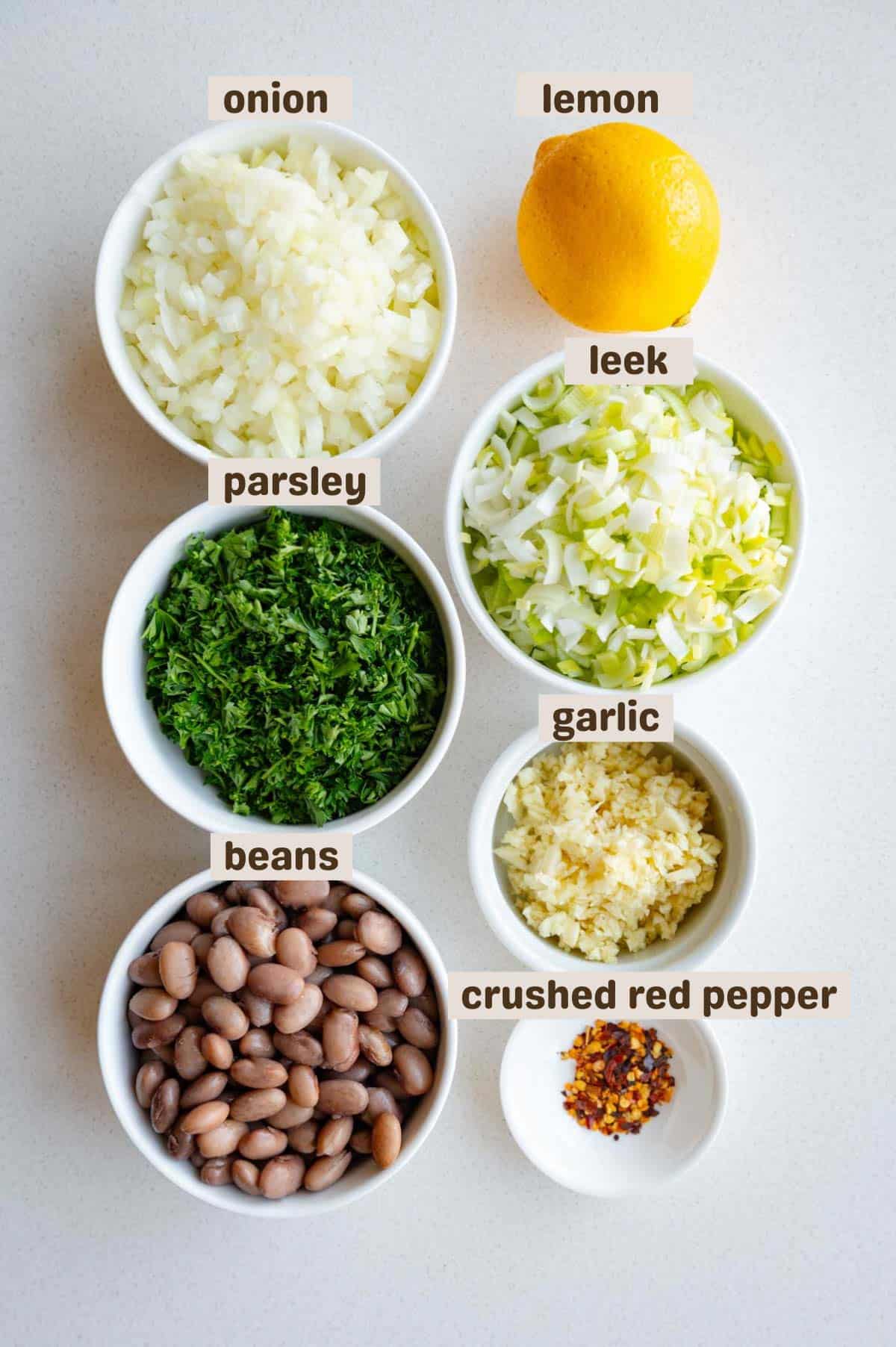 Onion, cooked pinto beans, crushed red pepper, garlic, parsley, and lemon.