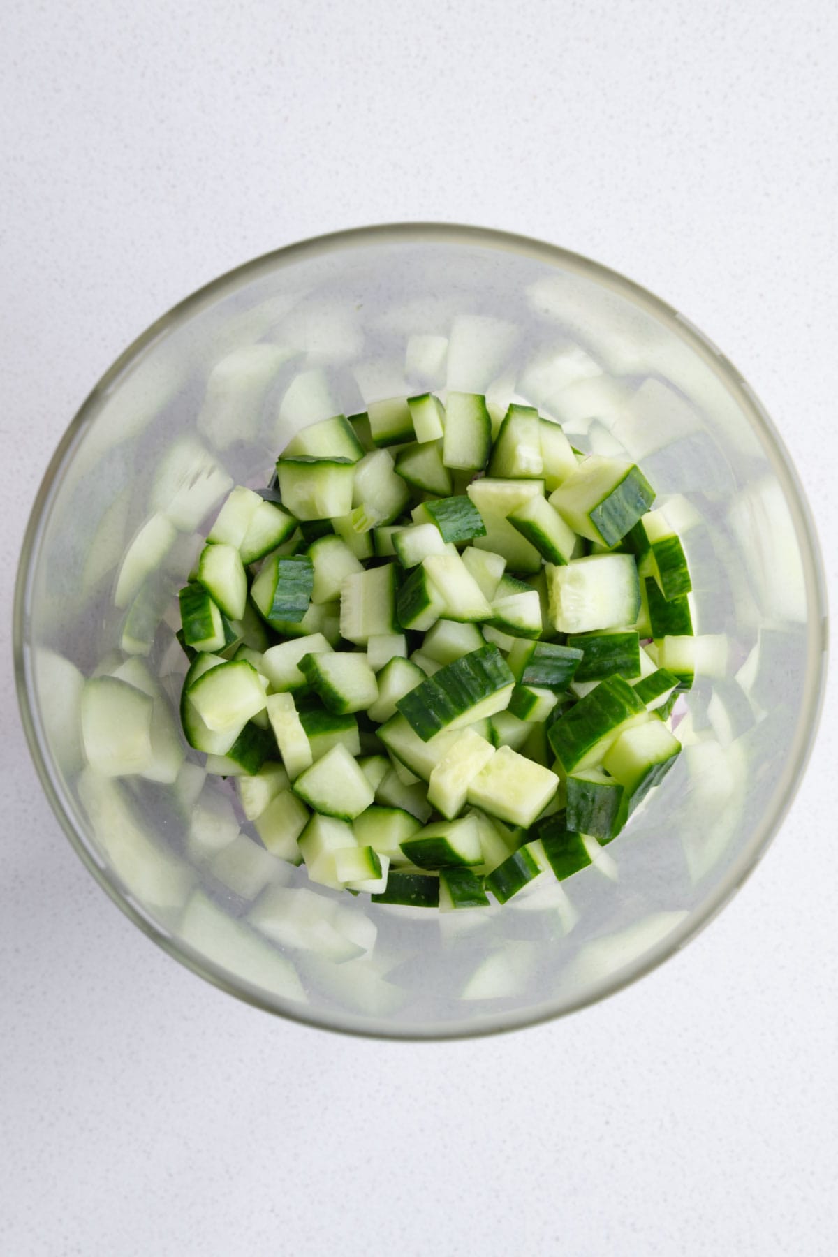 Cucumber in a glass salad jar.