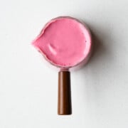 Beet salad dressing in a glass pourer.