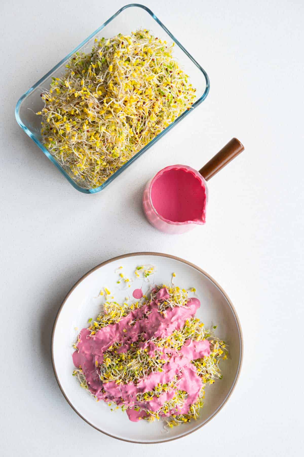 Beet salad dressing and broccoli sprouts.