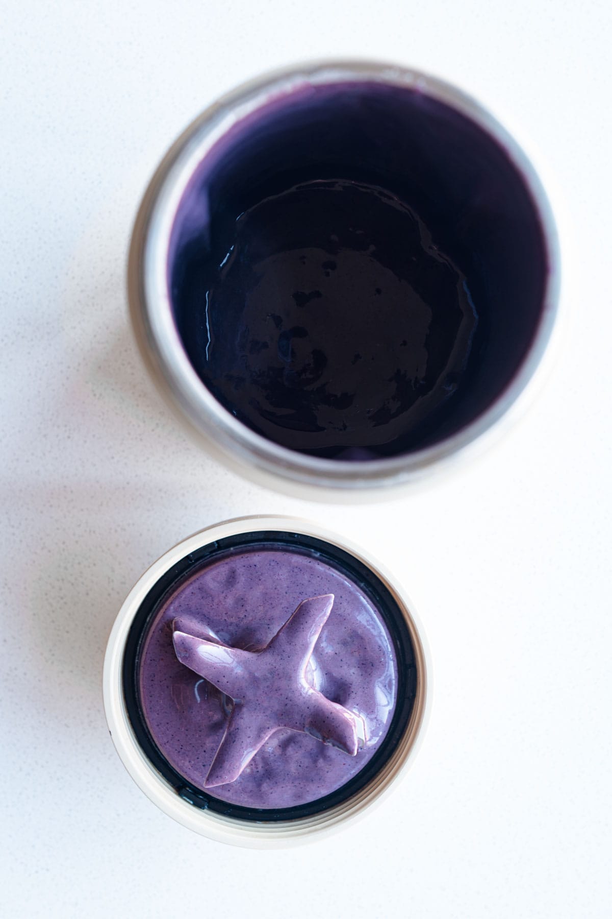 Blue creamy substance in a blender.