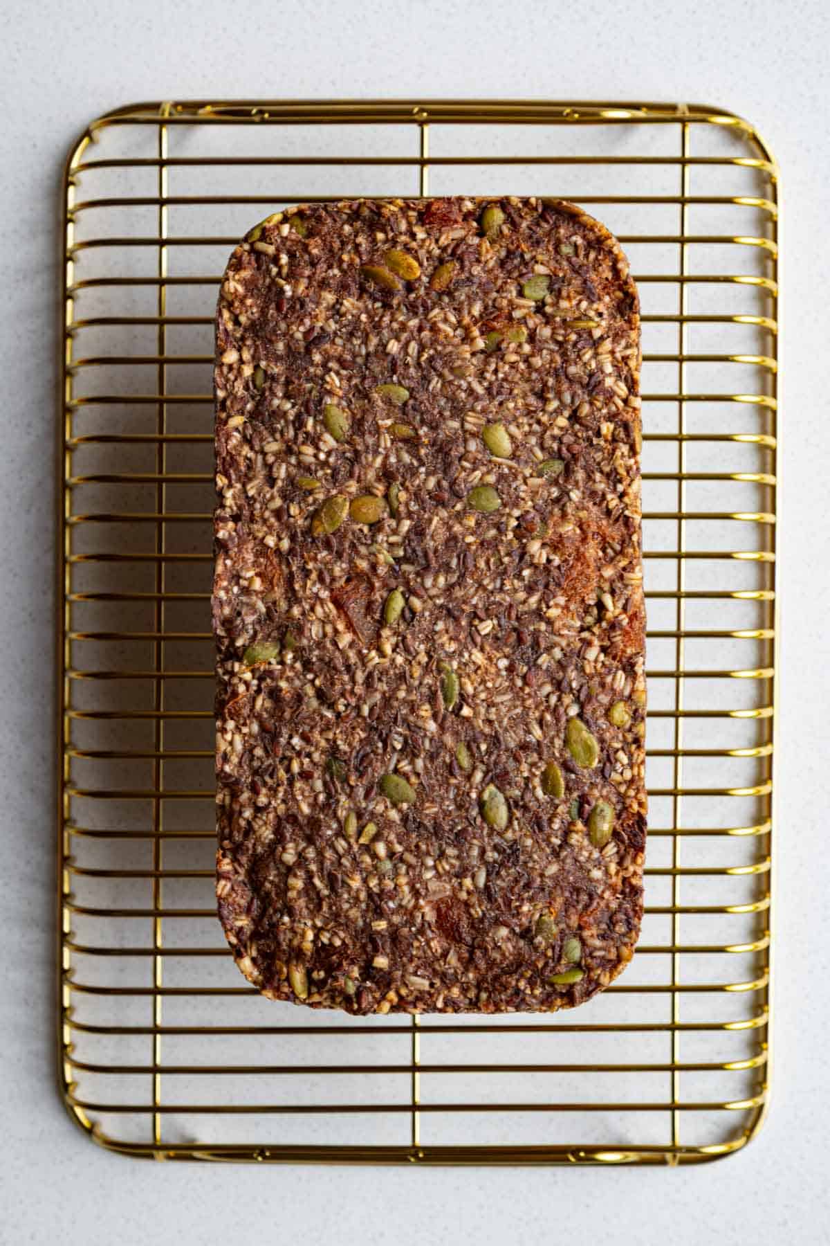 Homemade bread on a cooling rack.
