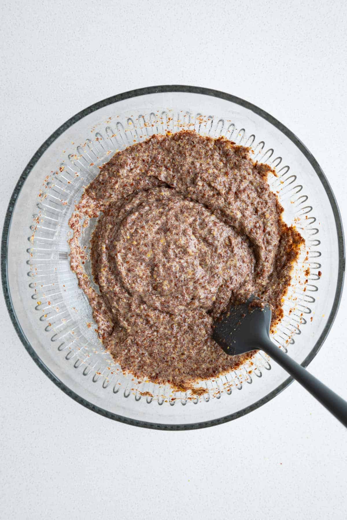 Mixed flax dough in a bowl.